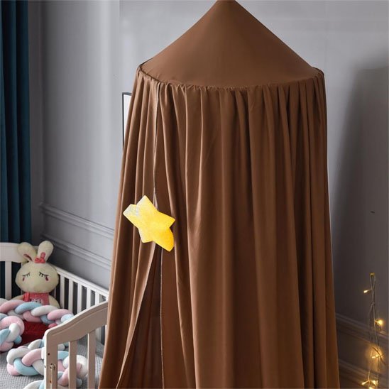 Brown baby crib canopy with yellow star, cozy nursery decor for sweet sleep