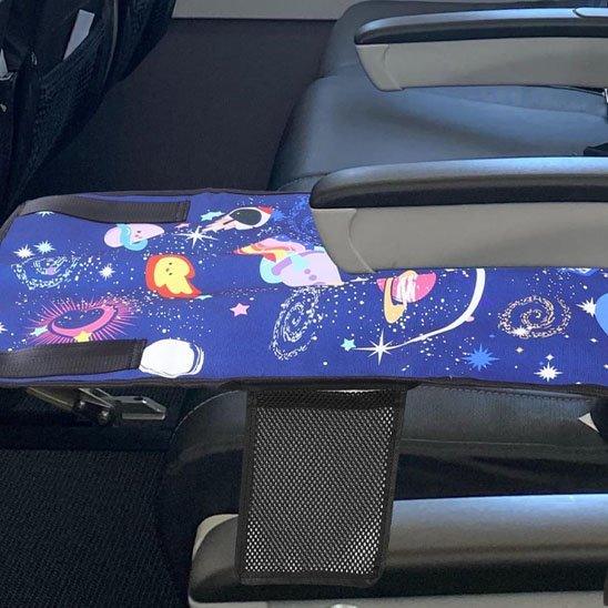 Space-themed baby car seat belt cover with planets and stars, soft padding for toddler comfort during travel
