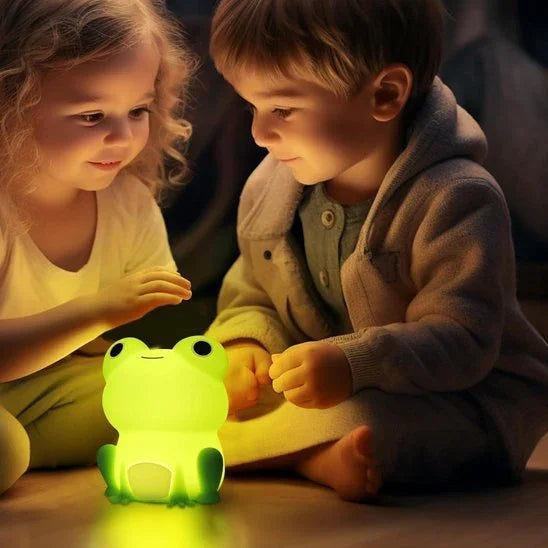 Adorable frog night light glowing softly for kids' bedtime comfort and cozy nursery ambiance