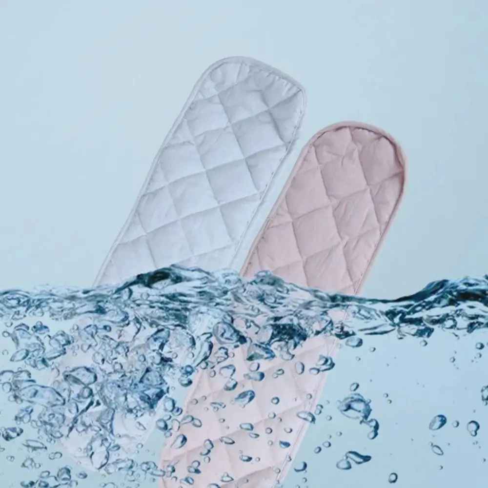 Quilted baby burp cloths in white and pink, water-resistant, ideal for gentle baby care