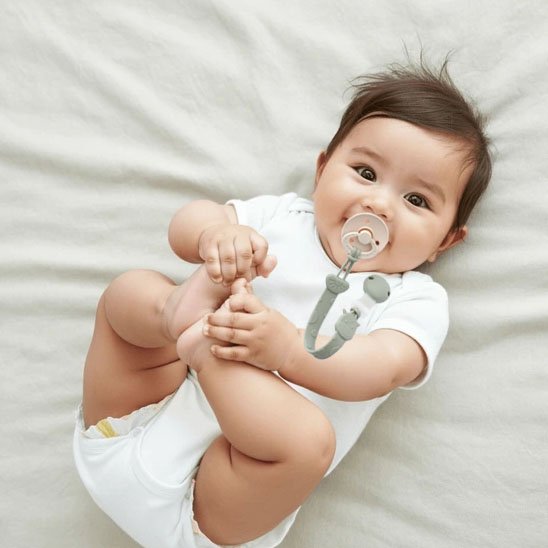 Attache tetine bébé sans BPA, facile à nettoyer, coloris pastel doux et modernes