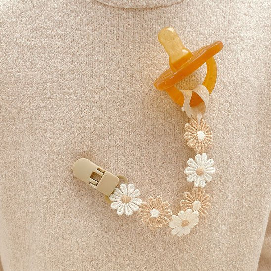 Floral pacifier clip with daisy design for baby comfort and style