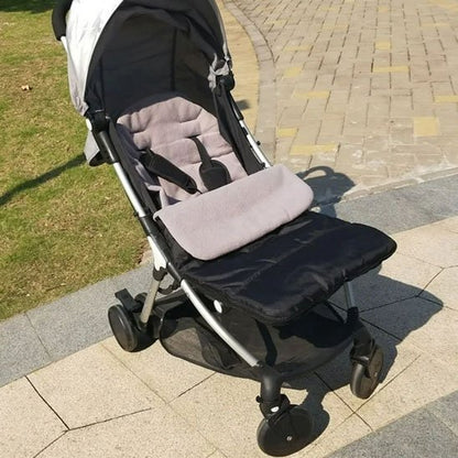 Chanceliere poussette design neutre, compatible avec la plupart des poussettes