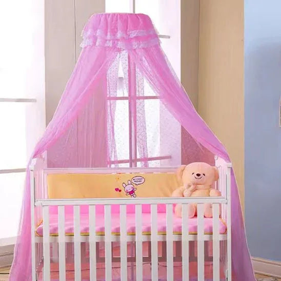 Pink baby crib with canopy, teddy bear, and soft bedding for sweet sleep