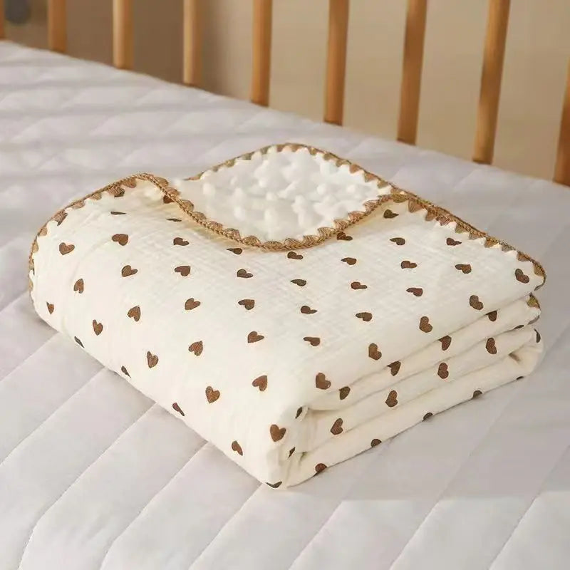 Couverture bébé en polaire douce, ornée de motifs cœurs imprimés