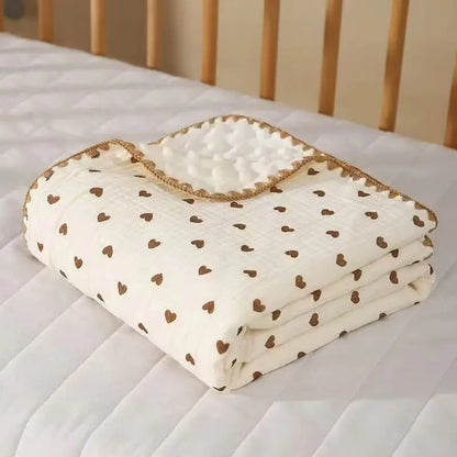 Couverture bébé en polaire douce, ornée de motifs cœurs imprimés
