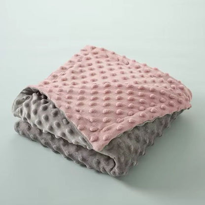 Soft pink and gray minky dot baby blanket for cozy sleep, gentle texture for newborns and infants