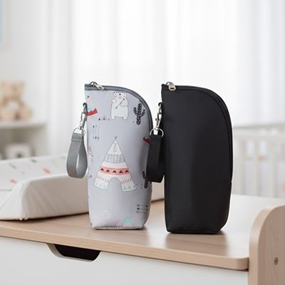 Adorable baby diaper bag with teepee print, perfect for nursery essentials and on-the-go comfort
