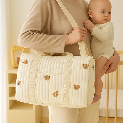 Soft quilted baby diaper bag with bear motifs, perfect for baby essentials and comfort