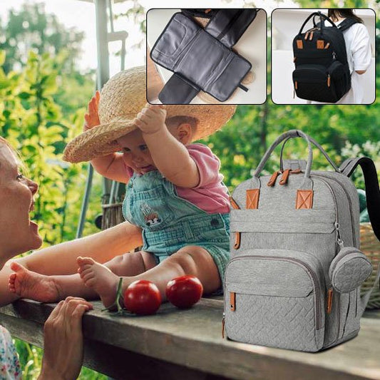 Gray quilted diaper backpack with orange accents, perfect for baby outings and nappy changes