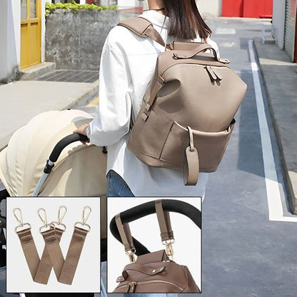Stylish beige mom backpack with stroller straps, perfect for baby essentials and daily outings