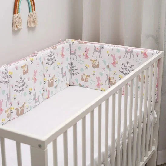 Crib bumper with cute woodland animals and floral print, soft baby bedding for safe, cozy nursery sleep