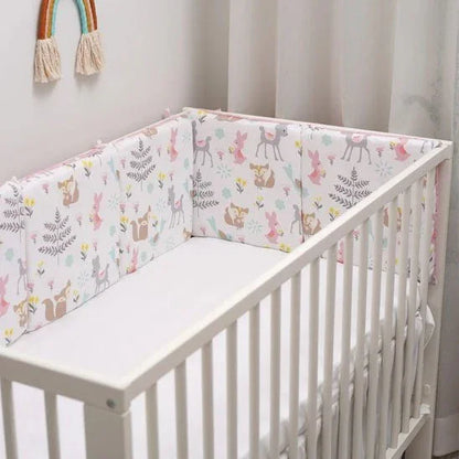 Crib bumper with cute woodland animals and floral print, soft baby bedding for safe, cozy nursery sleep