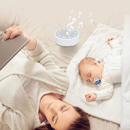 Baby sleeping peacefully with white noise machine and mom relaxing nearby